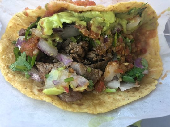 Tacos El Gordo signature dishes Adobada (spicy pork) Tacos, Carne Asada Tacos, Lengua (beef tongue) Tacos, Loaded Fries.